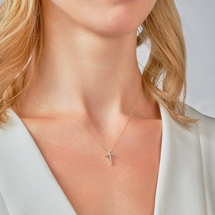9ct gold diamond cross necklace on model