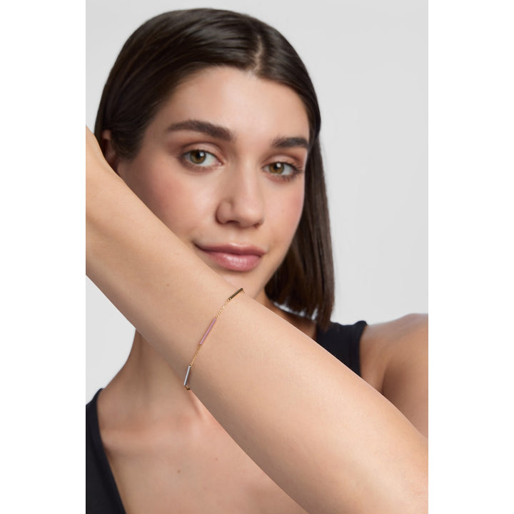 model wearing three tone 9ct gold bracelet