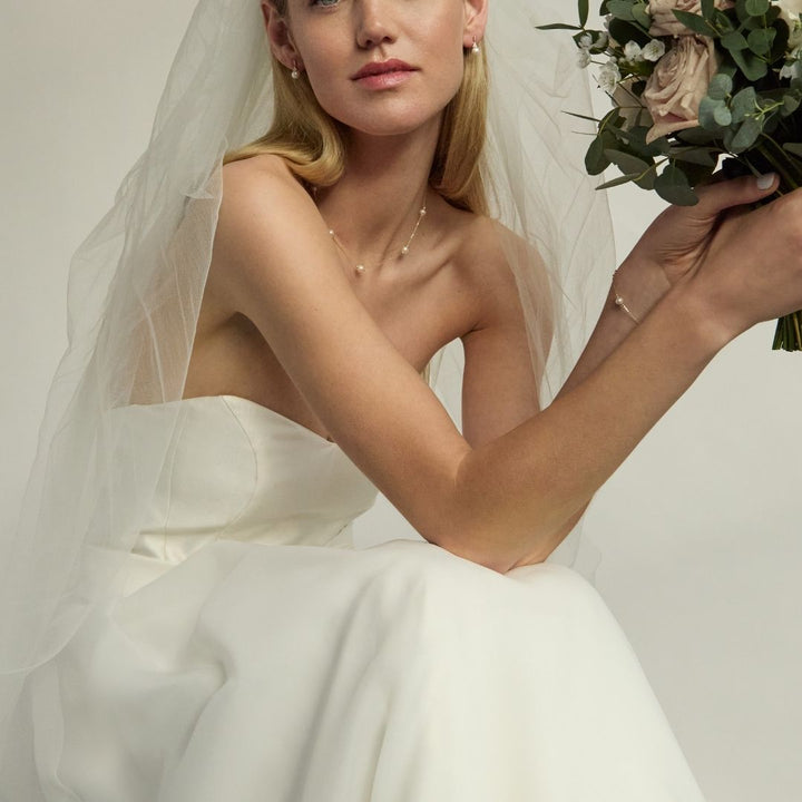 bride wearing 9ct gold bridal pearl jewellery