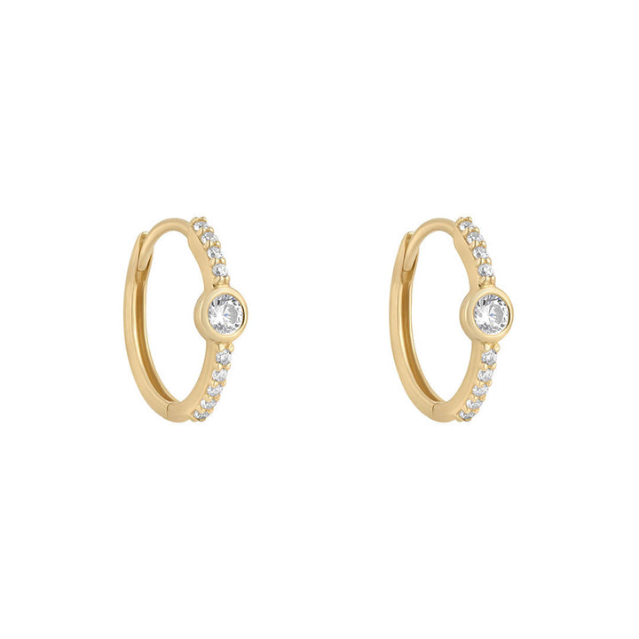 9ct gold cz rubover huggie earrings on white background