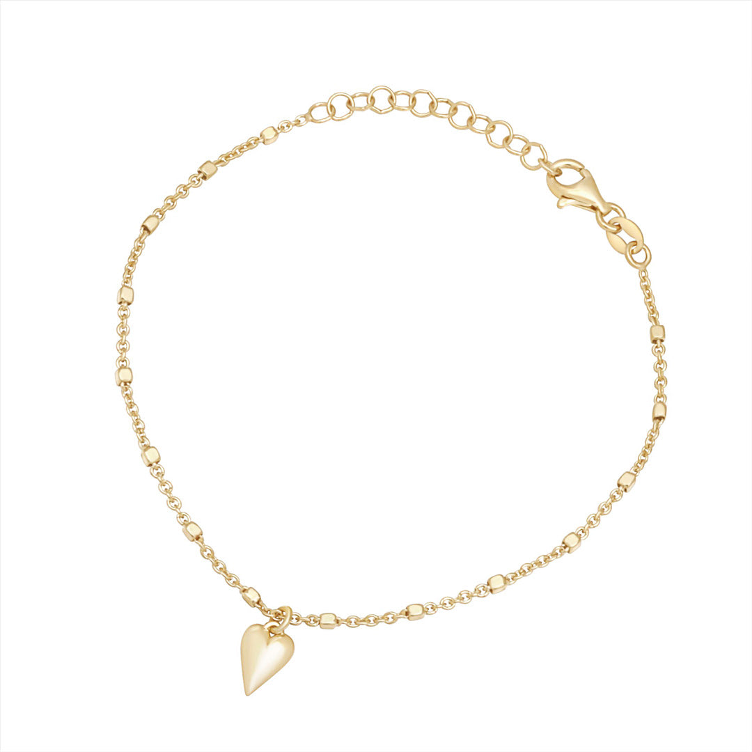 gold plated heart drop bracelet on white background