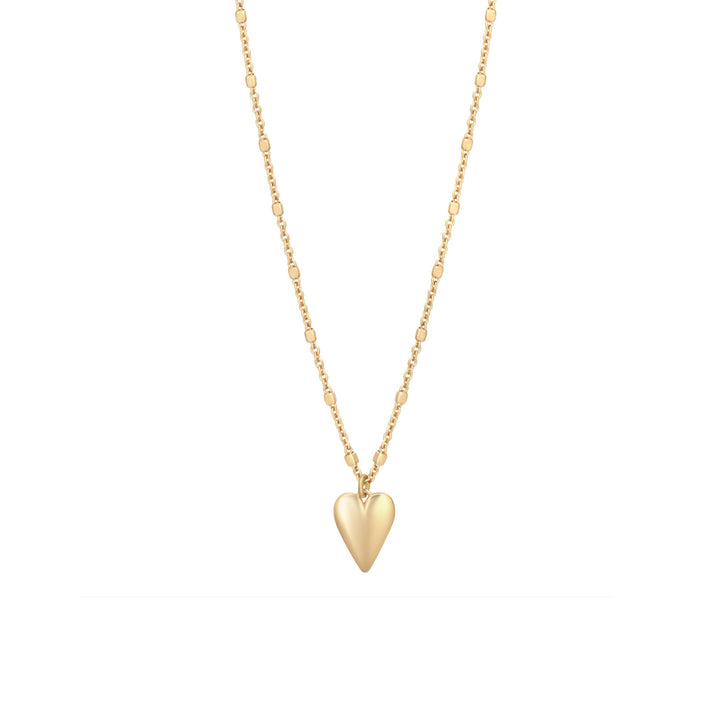 gold plated heart drop necklace on white background