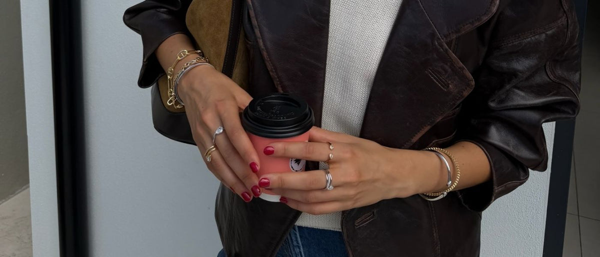 model wearing mixed metal jewellery stack
