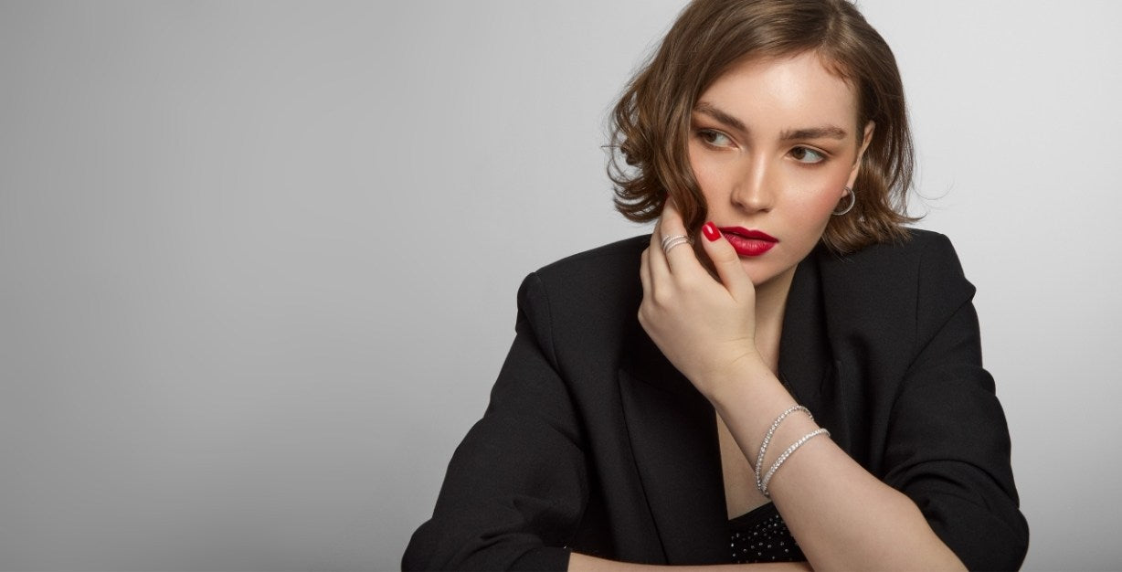 model wearing sterling silver tennis jewellery