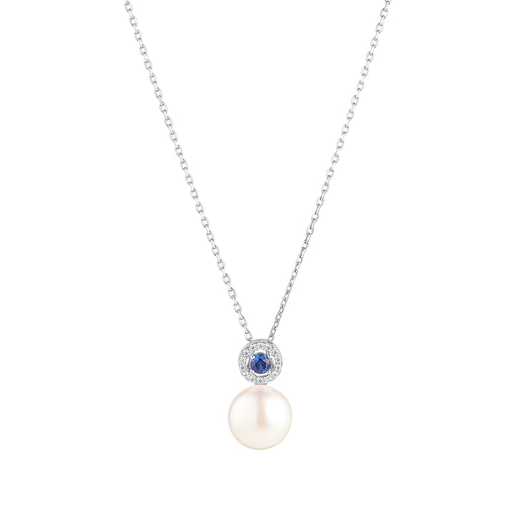silver cubic zirconia and sapphire pearl pendant on white background