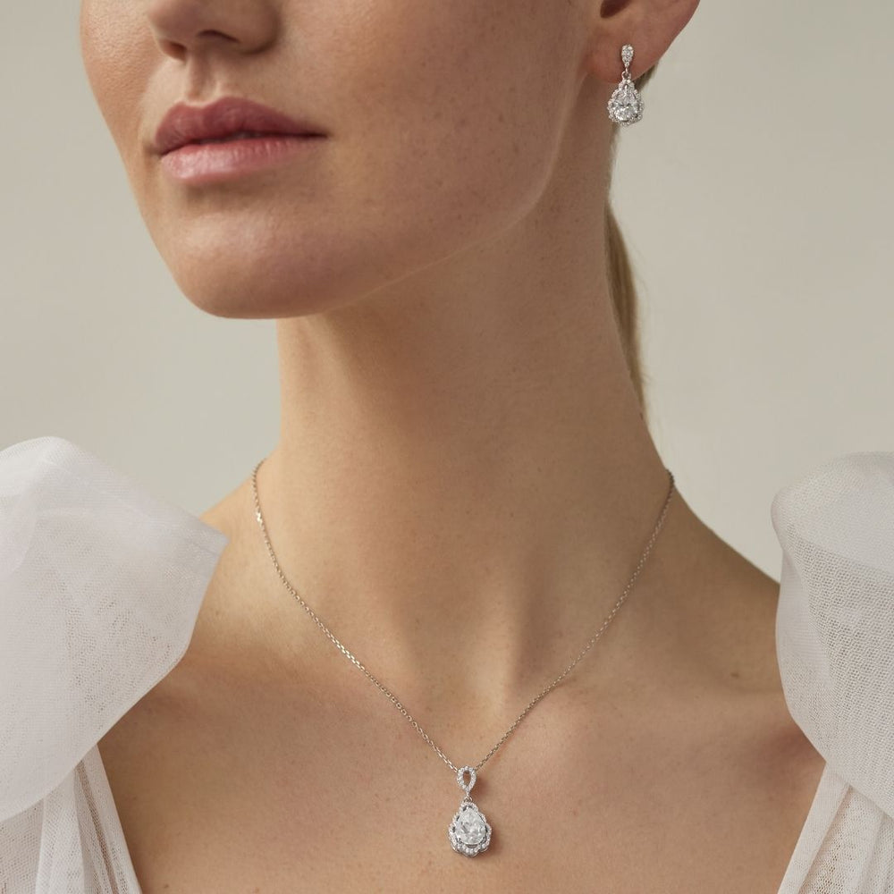 bride wearing sterling silver cz necklace and drop earrings