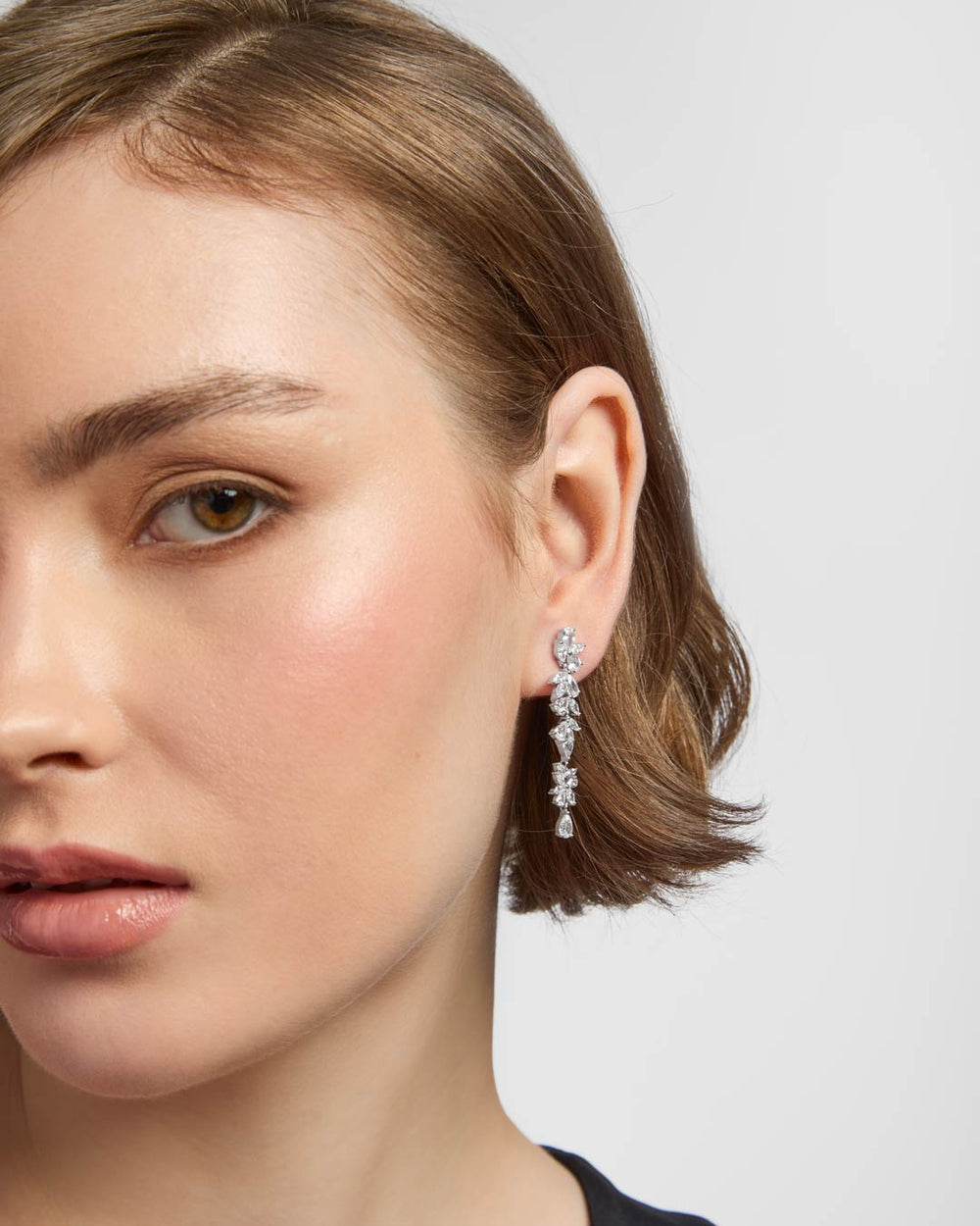 model wearing sterling silver cz drop earrings