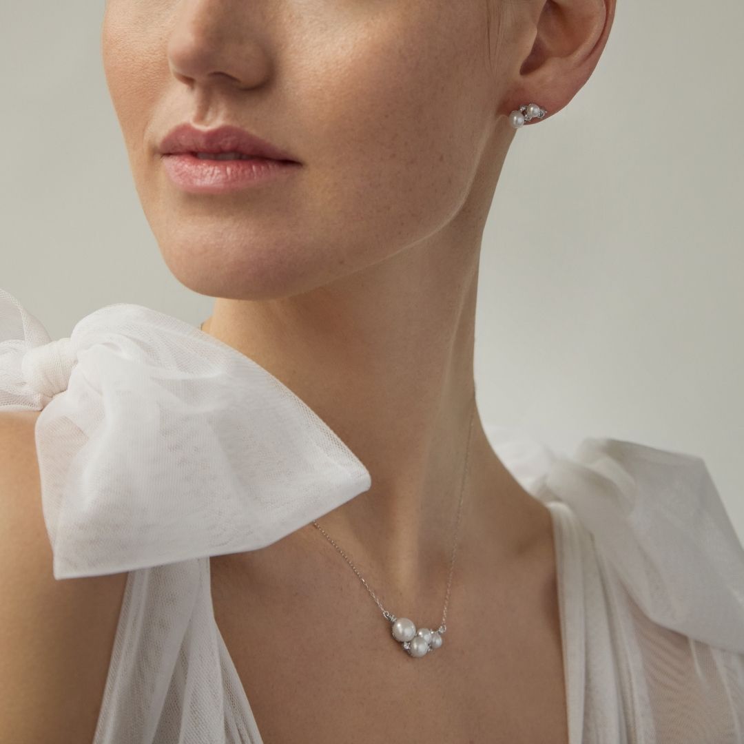 sterling silver pearl necklace and earrings on bride