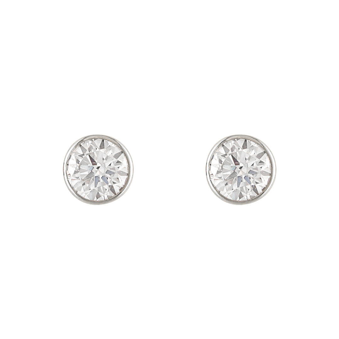 white gold cz rubover stud earrings on white background