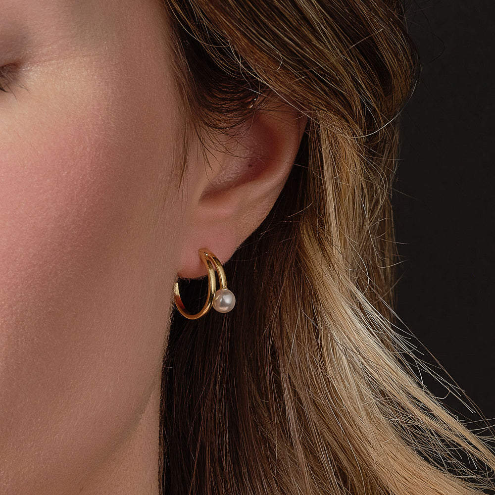 gold plated pearl hoop earrings on model