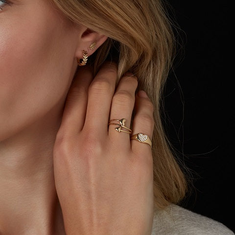 9ct gold heart and arrow ring on model