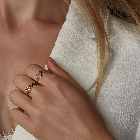 9ct gold heart ring on model