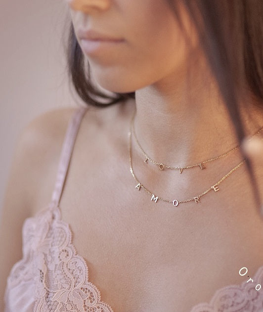 9ct gold AMORE necklace on model