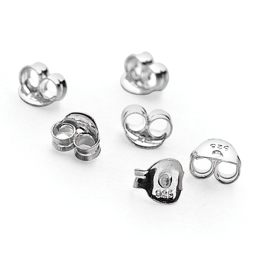 lifestyle image of butterfly earring backs in silver
