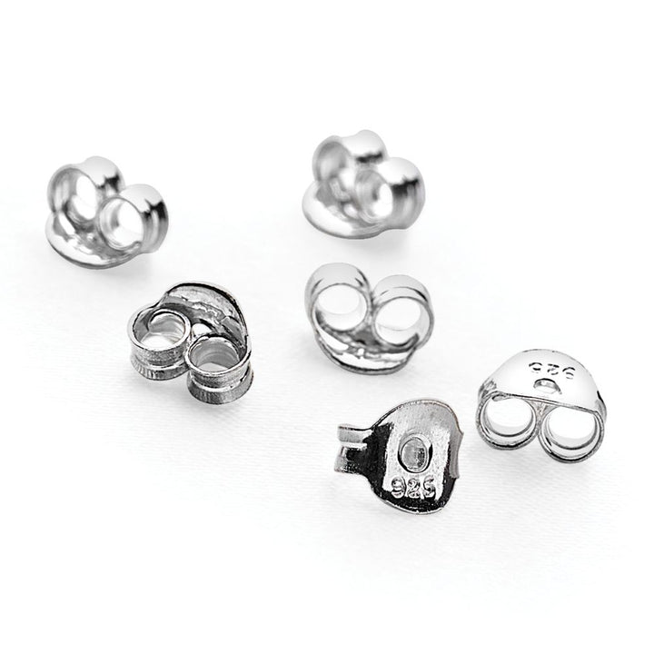 lifestyle image of butterfly earring backs in silver