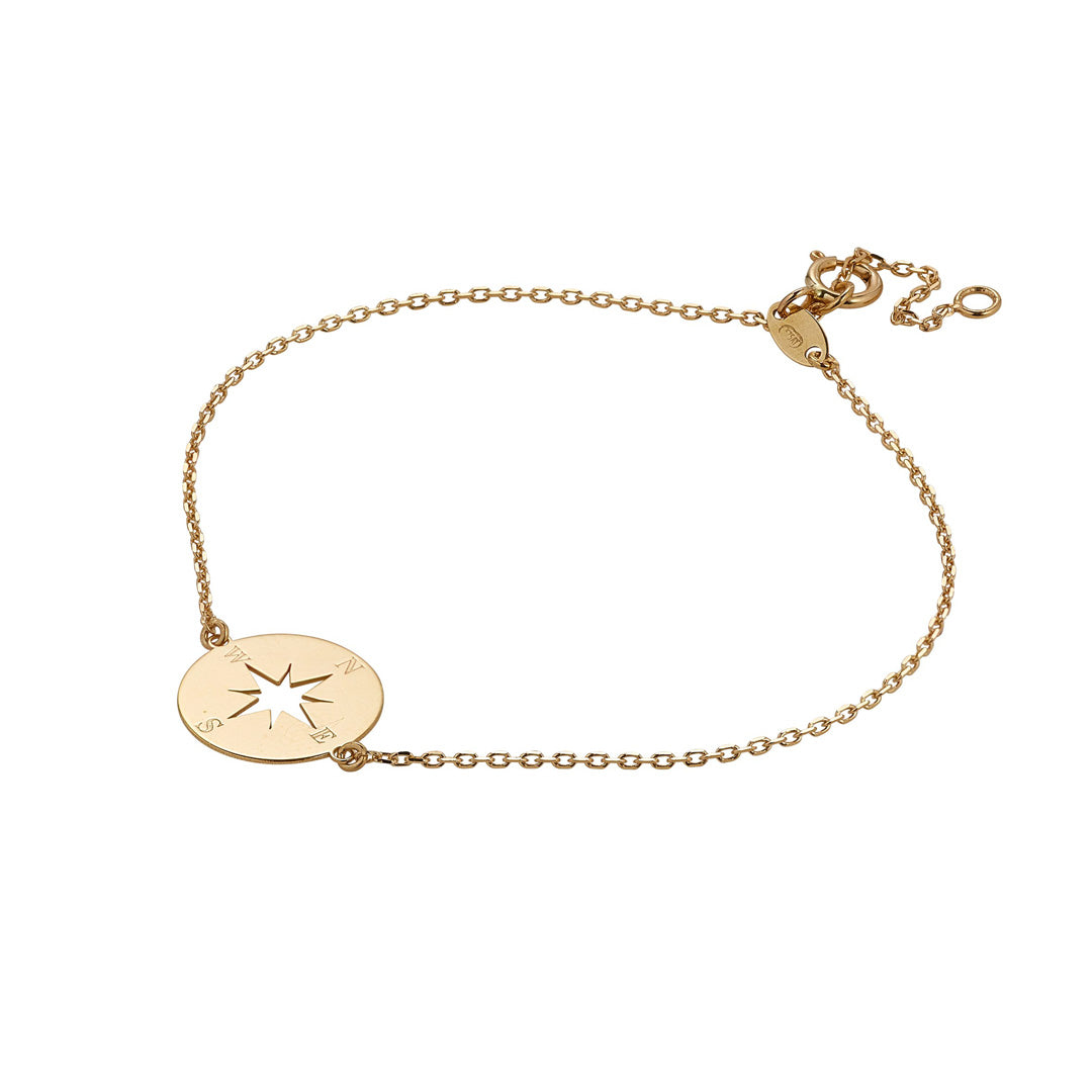 9ct gold compass bracelet on white background