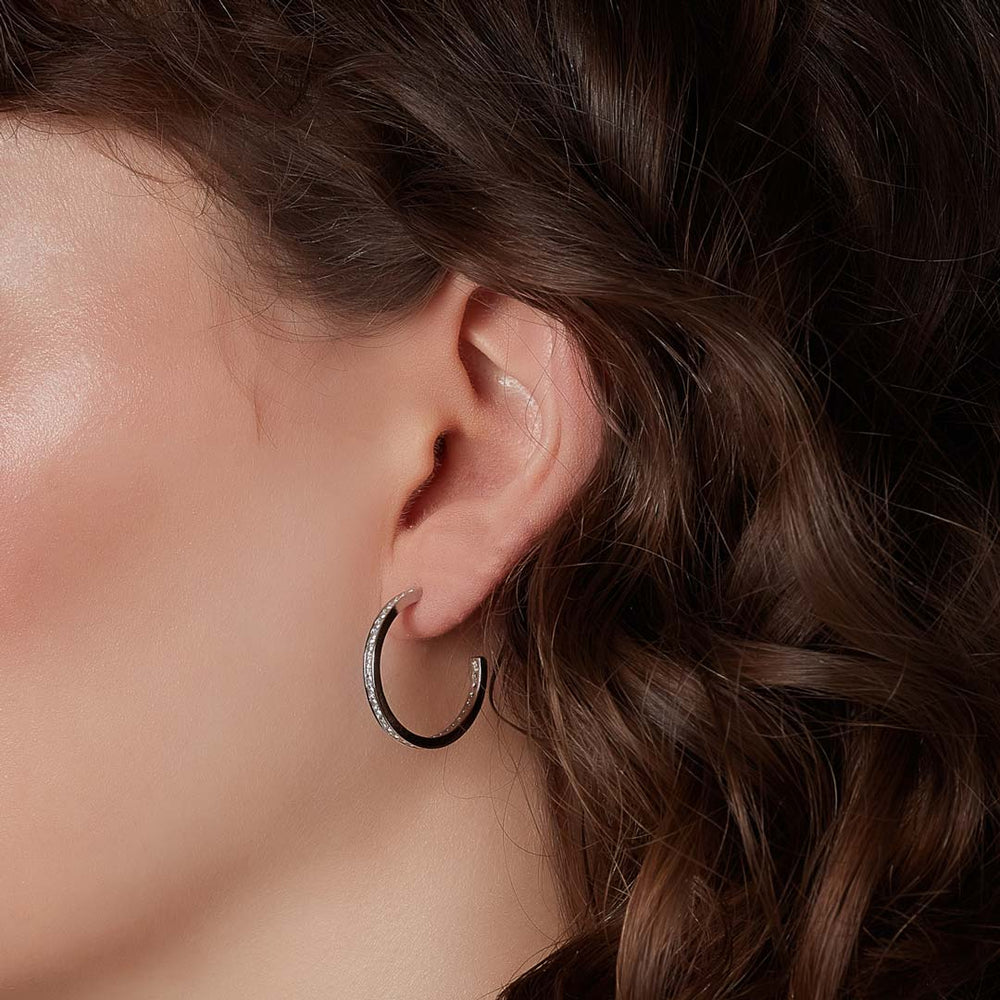 cz channel set hoop earrings on model
