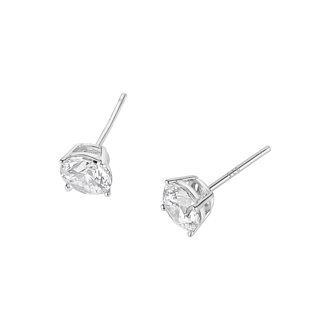 cubic zirconia solitaire stud earrings in silver on white background
