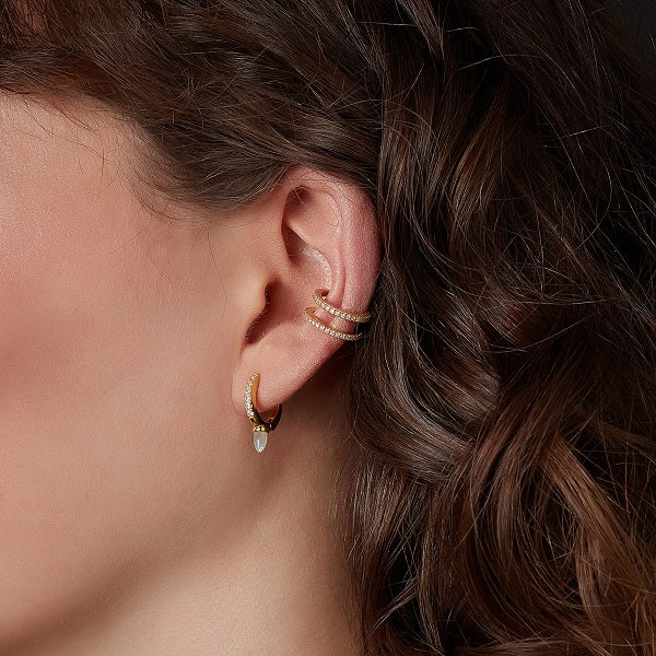 gold-plated cz double bar ear cuff earrings on a model