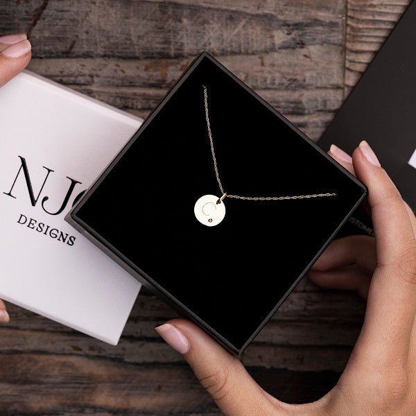 engravable disc pendant in NJO Designs jewellery box