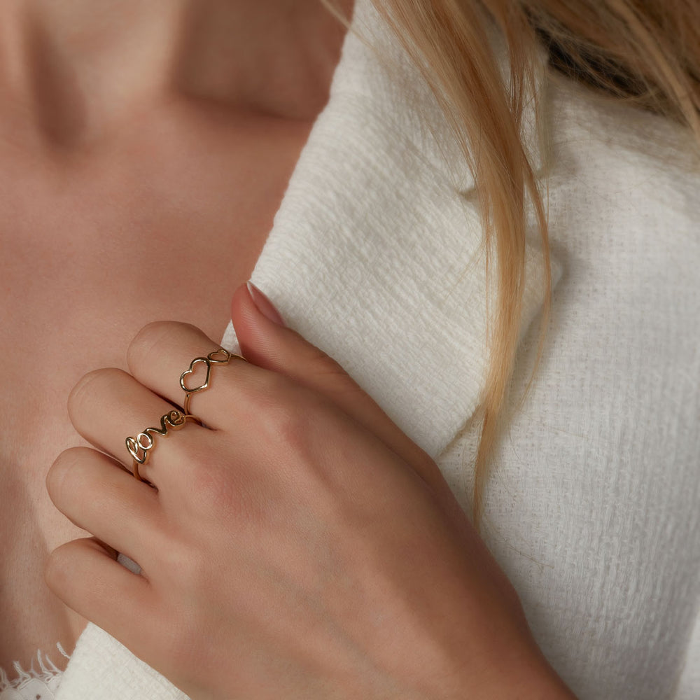 love ring and  heart ring on model