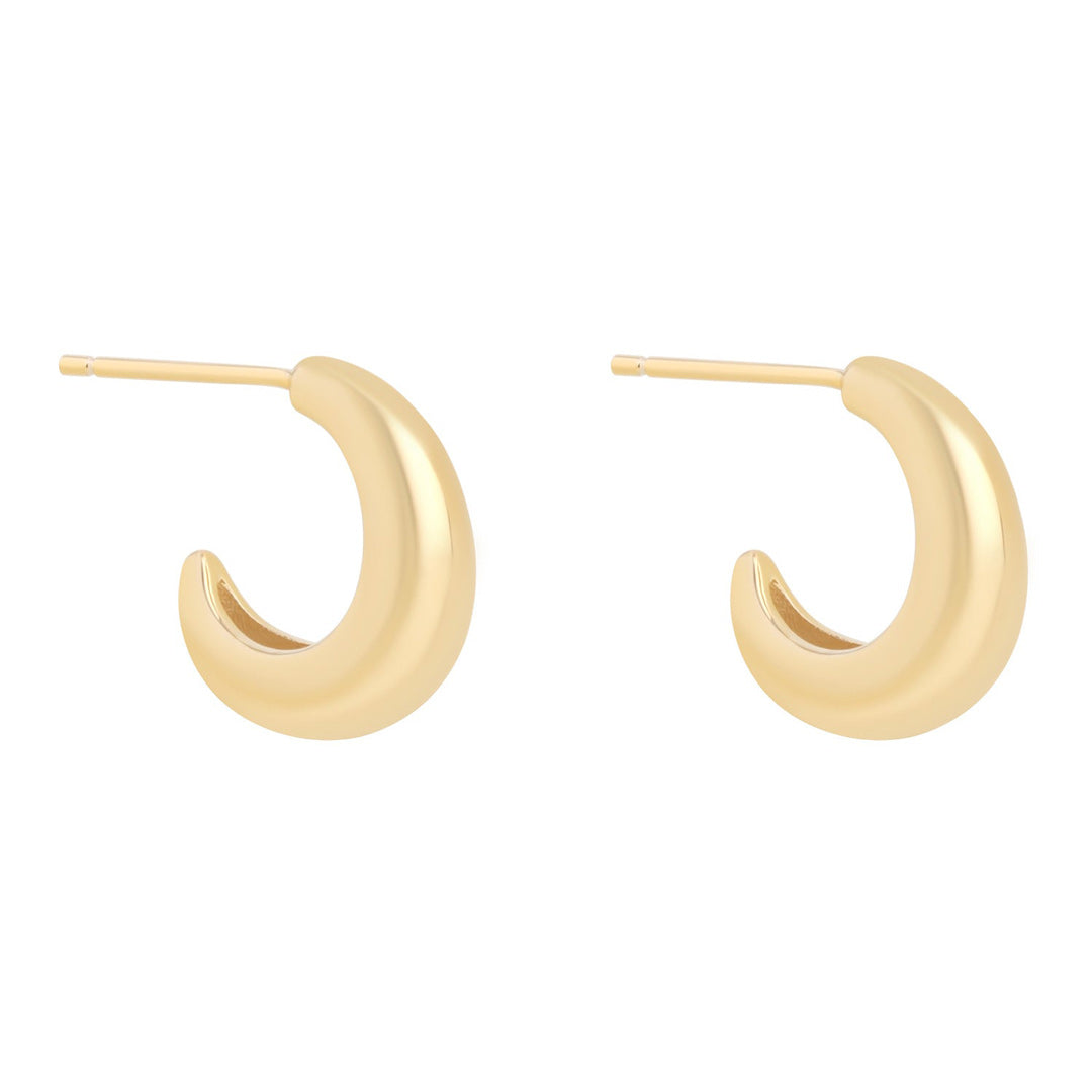 gold chunky open hoop huggie earrings on white background