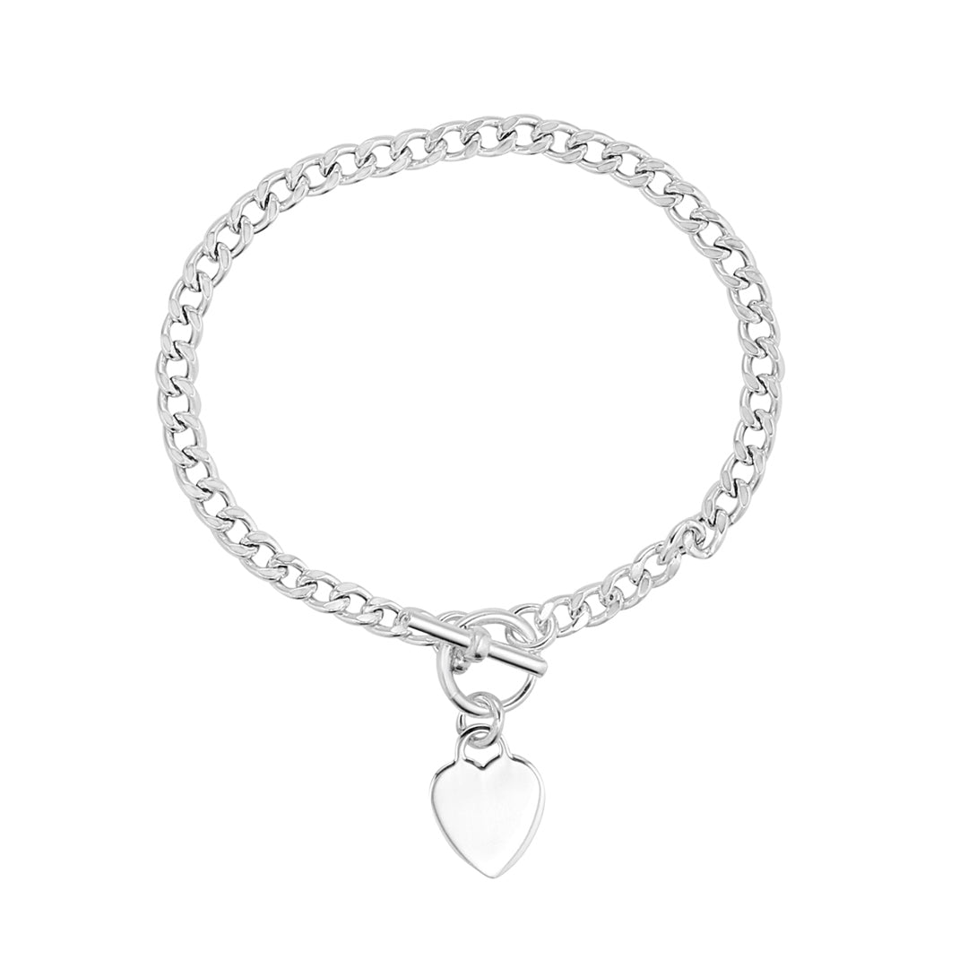A modern silver-tone curb chain bracelet with a sleek T-bar clasp, finished with a polished heart charm on a white background