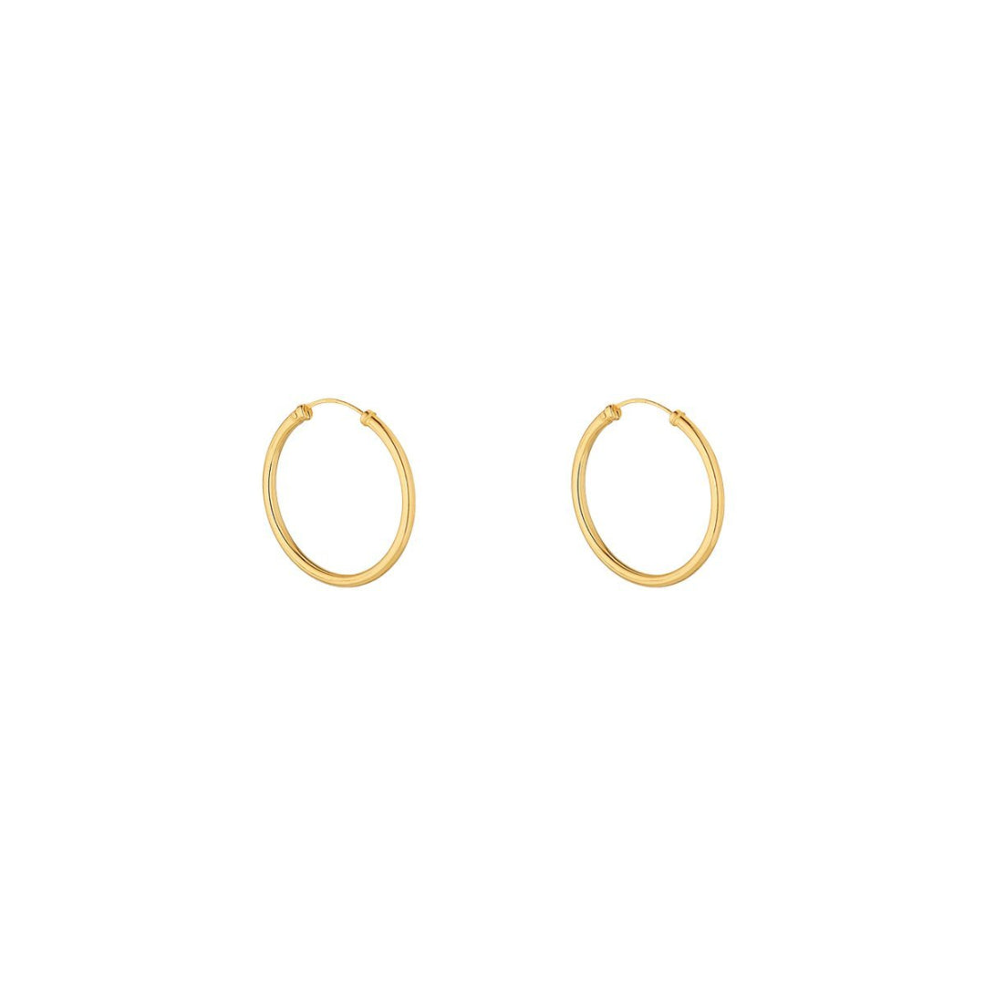 small sleeper earrings in yellow gold