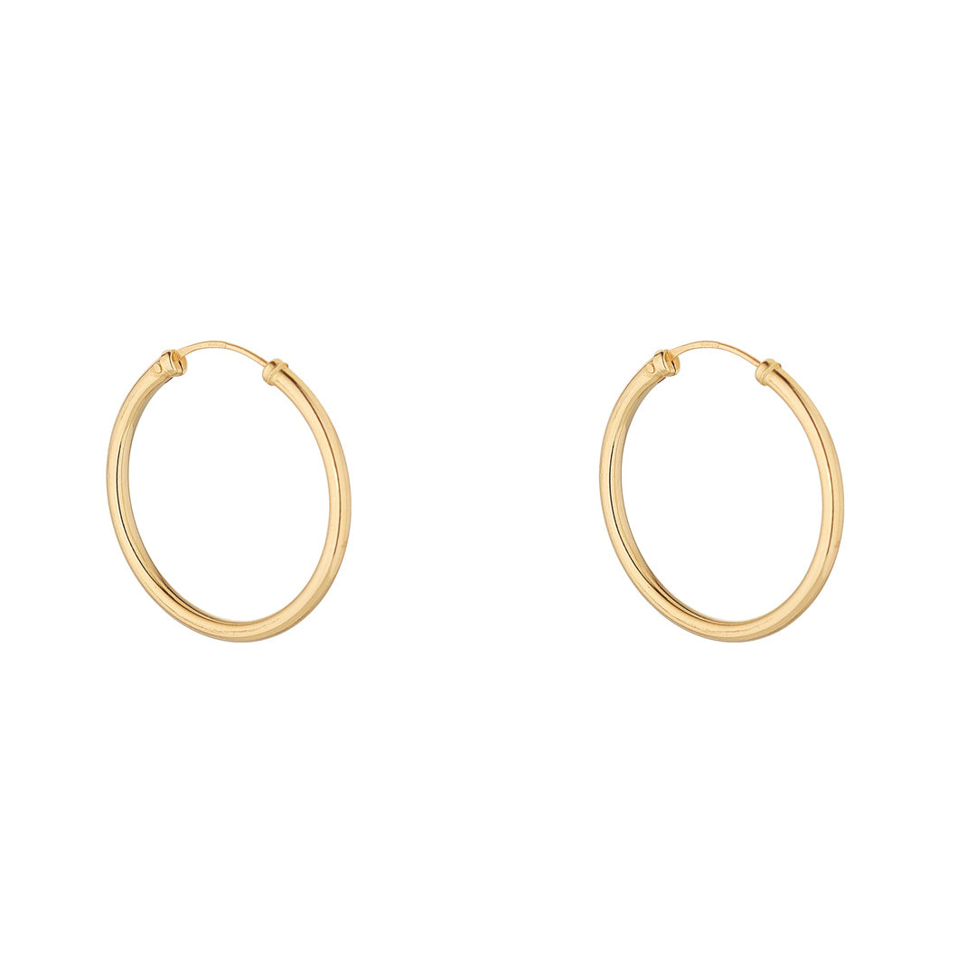 yellow gold sleeper earrings