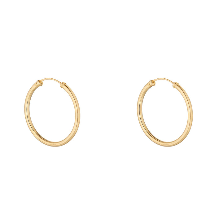 9ct gold 25mm sleeper hoop earrings on white background