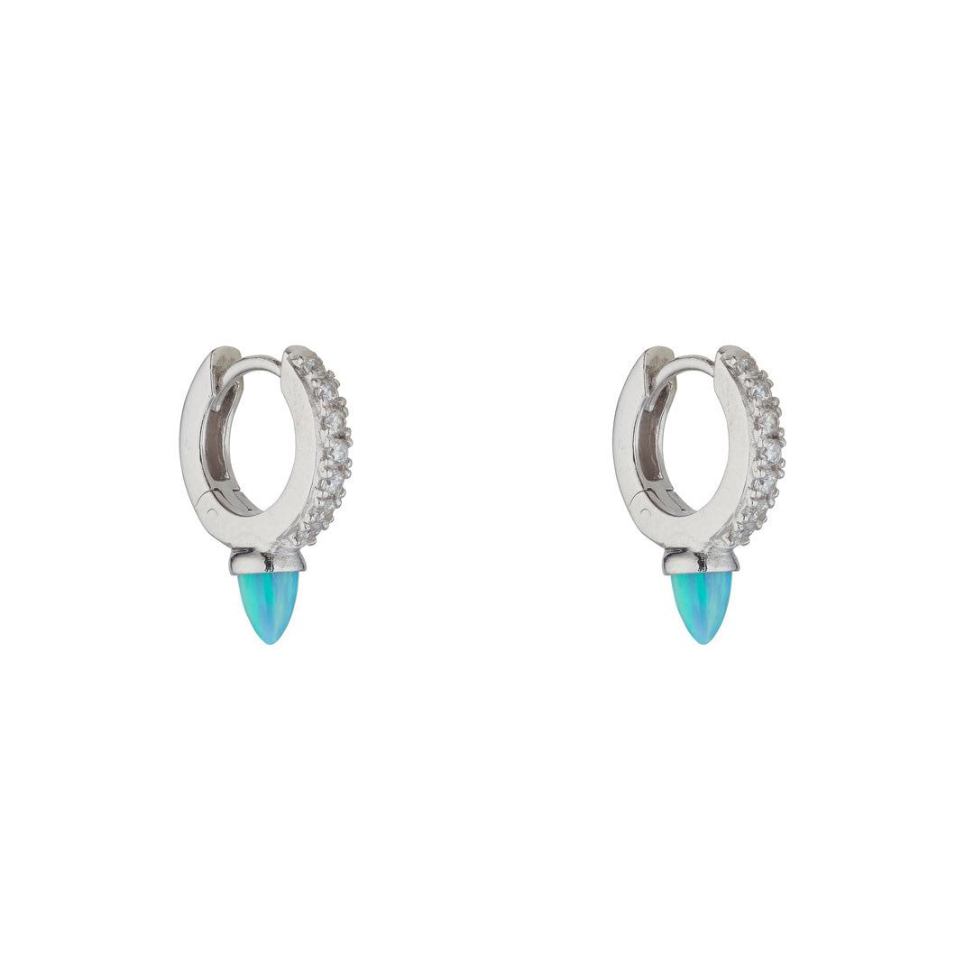 silver turquoise spike cubic huggie earrings on white background