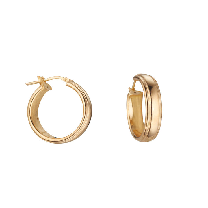 yellow gold wedding band hoop earrings on white background